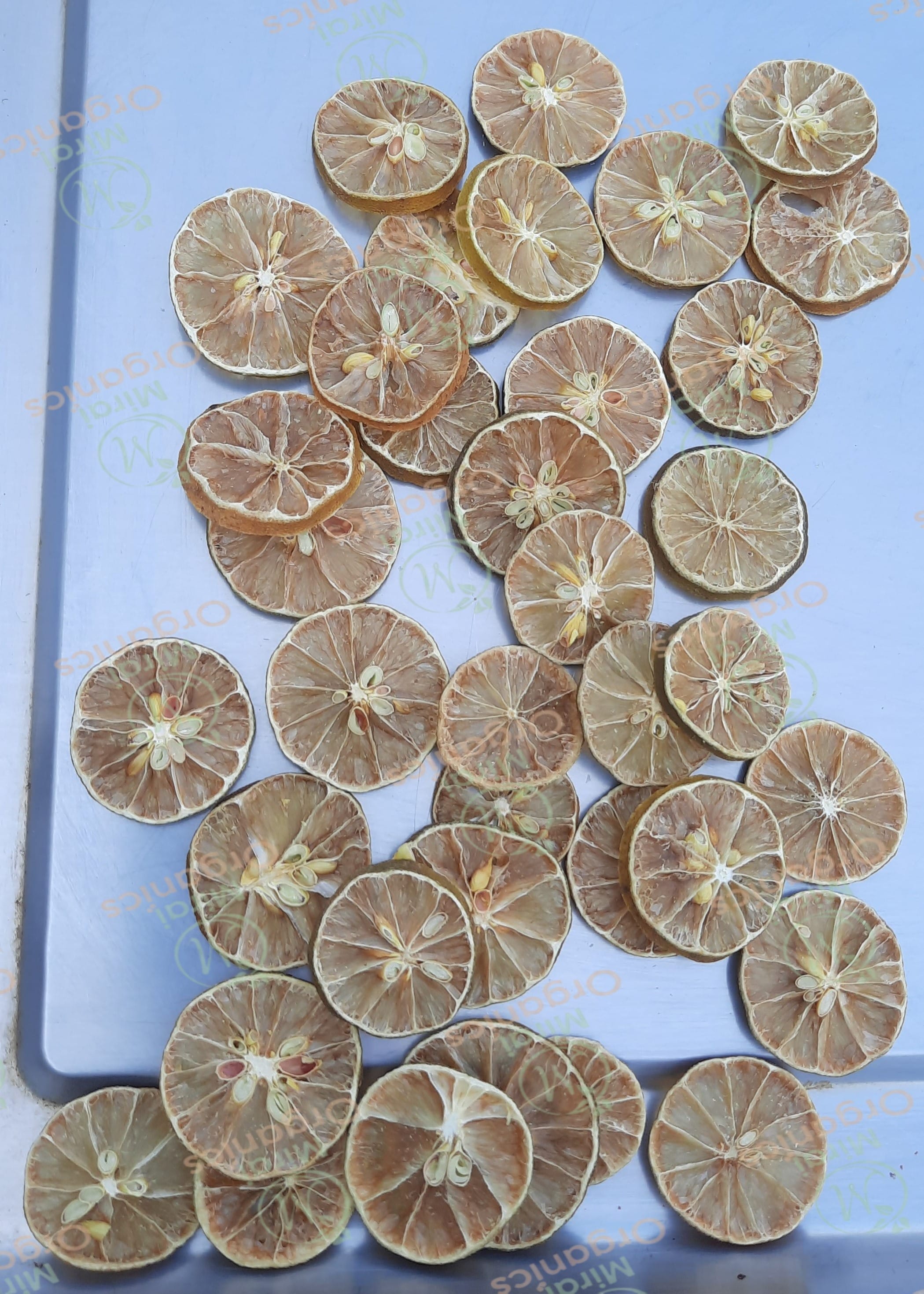 Dehydrated lemon slice rings air-dried to a light yellow finish